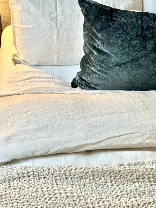 Close-up of textured pillows on a sofa. Bungalow Interiors Gold Coast