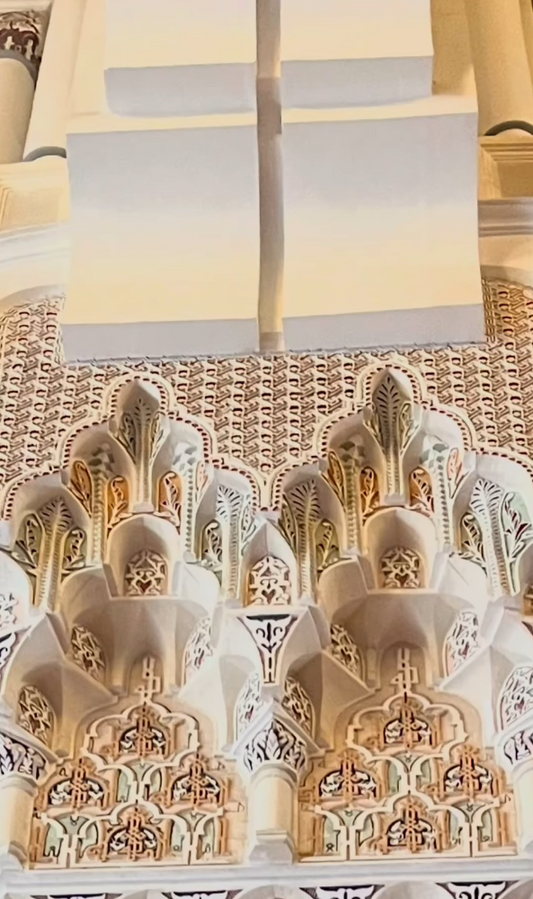 Decorative ceiling with intricate patterns and arches