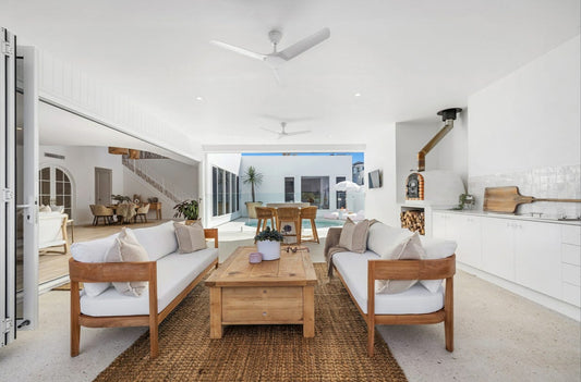Modern living room with wooden furniture and white decor.  Bungalow Interiors Gold Coast, coastal interior design styling