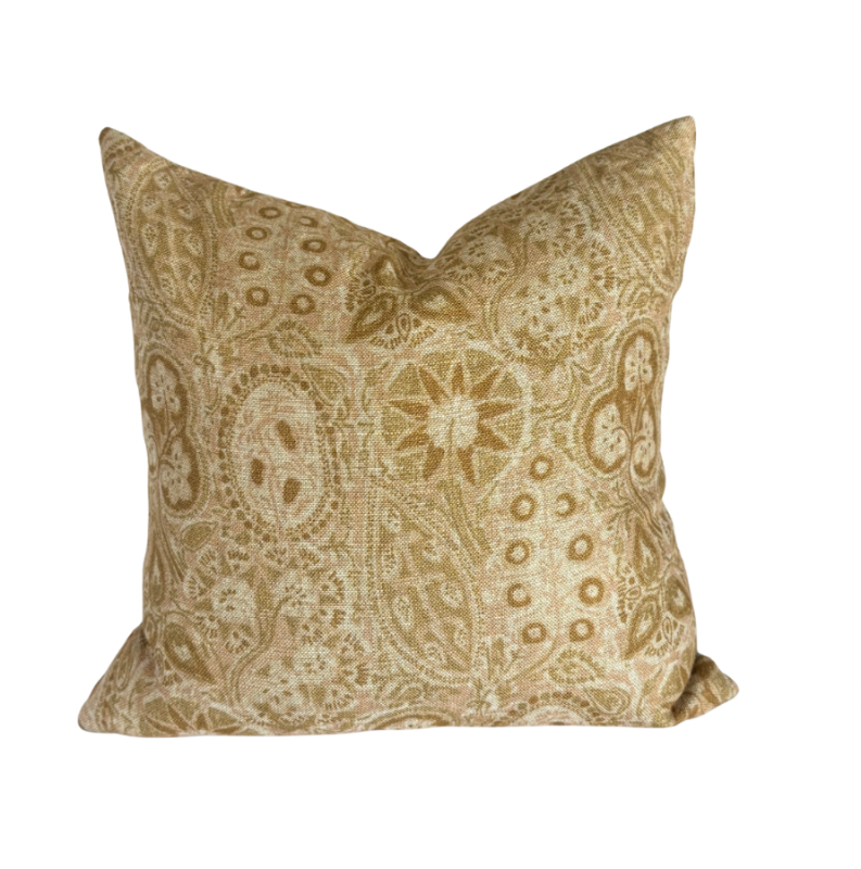 Decorative pillow with paisley pattern on a white background
